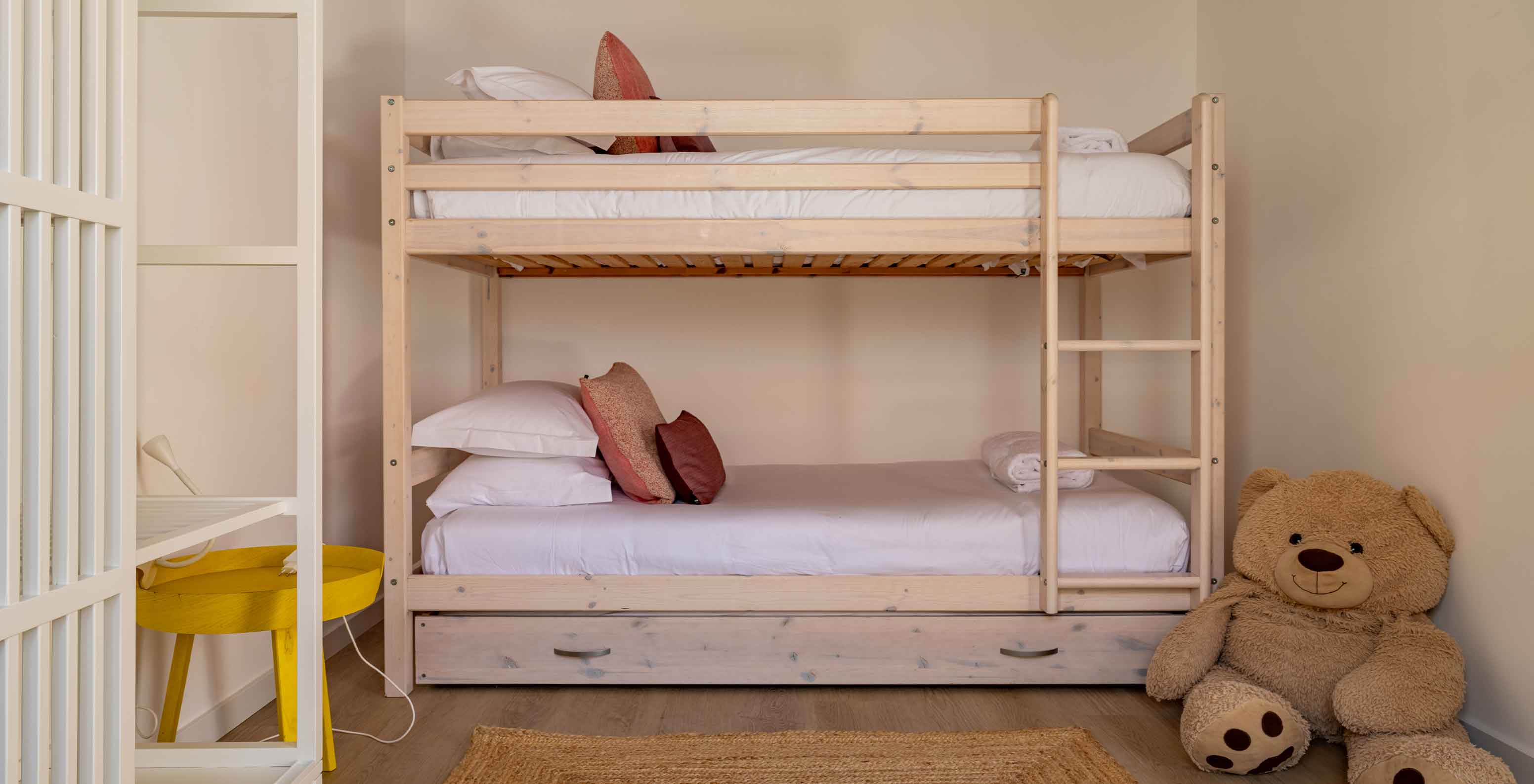 The Premium Green Villa at Pestana Comporta Village Residences has a wooden bunk bed with two beds and a teddy bear