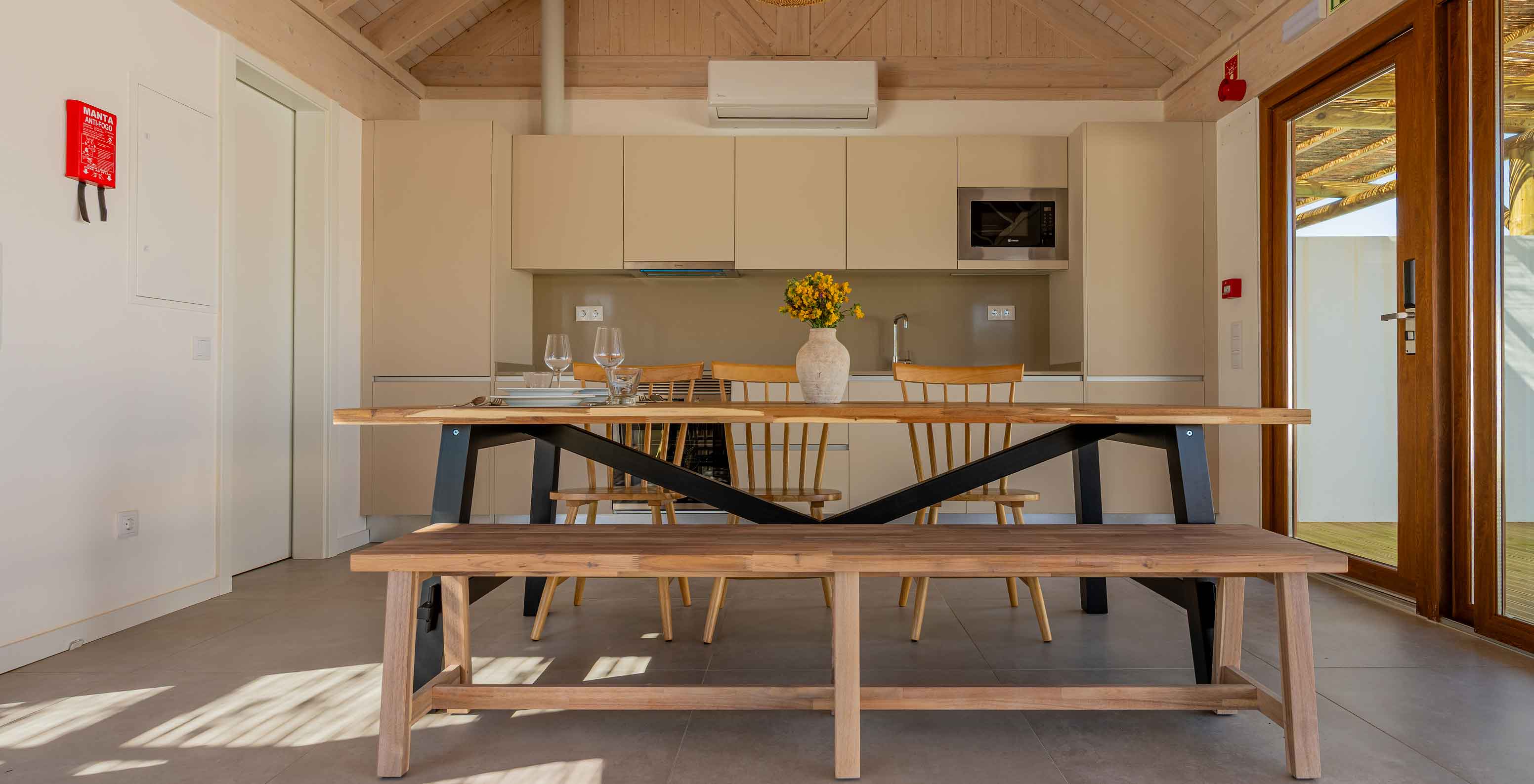 The Premium Green Villa at Pestana Comporta Village Residences has an equipped kitchen, air conditioning, and a dining table