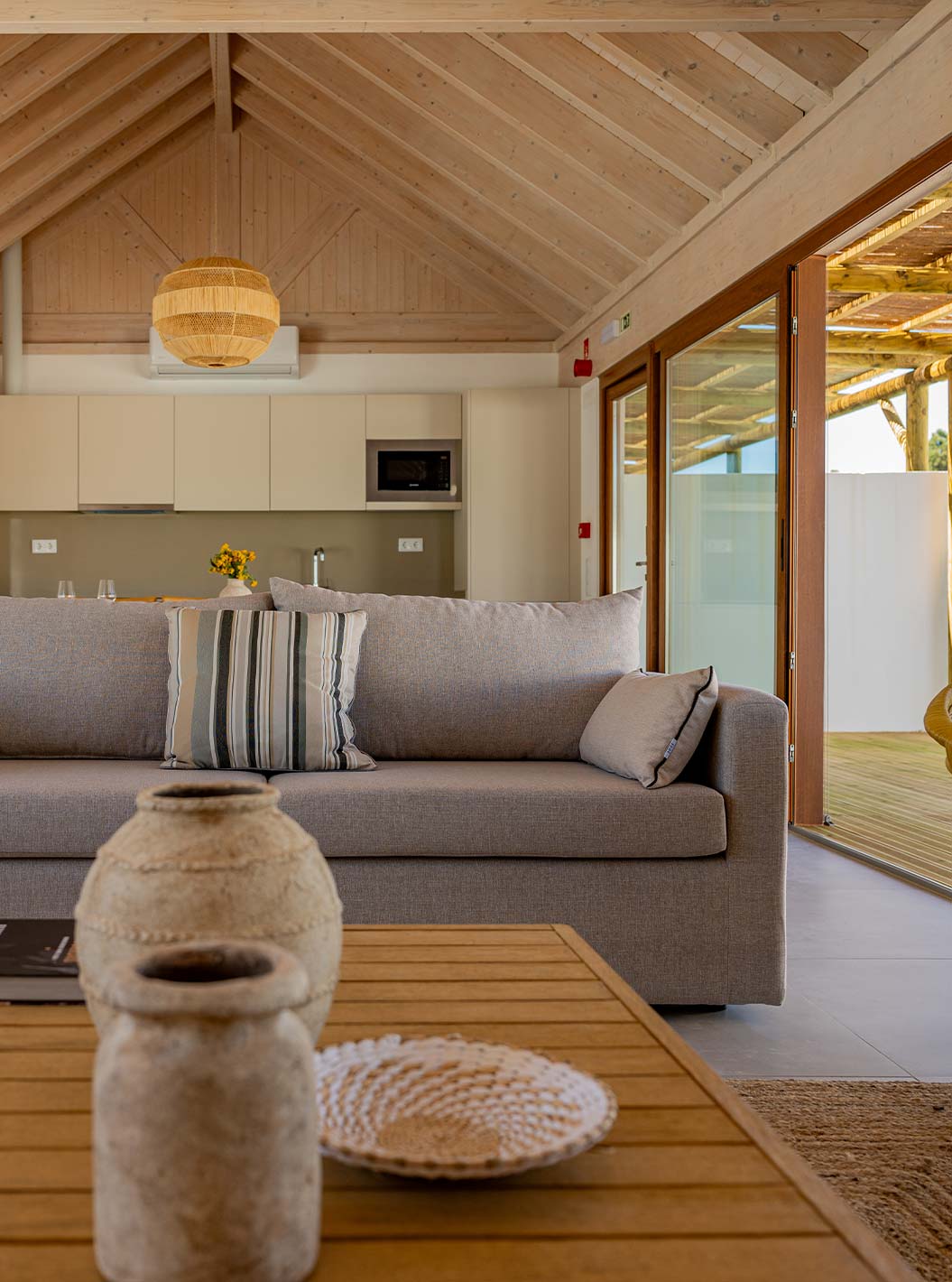 The Premium Green Villa at Pestana Comporta Village Residences has a bright living room with a sofa and decor