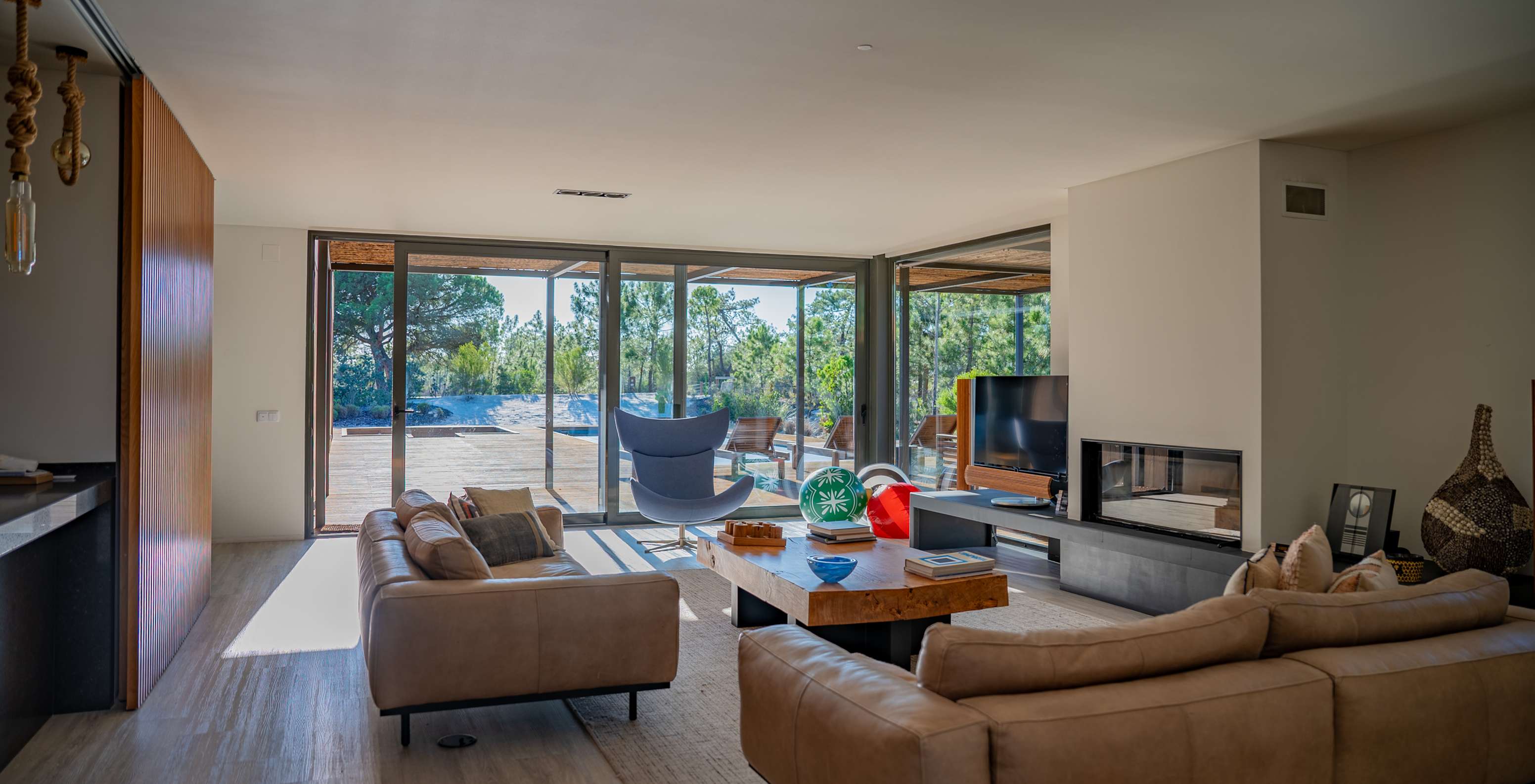 The Exclusive Villas with Private Pool of Pestana Tróia Eco Resort have a spacious living room with two sofas and a table