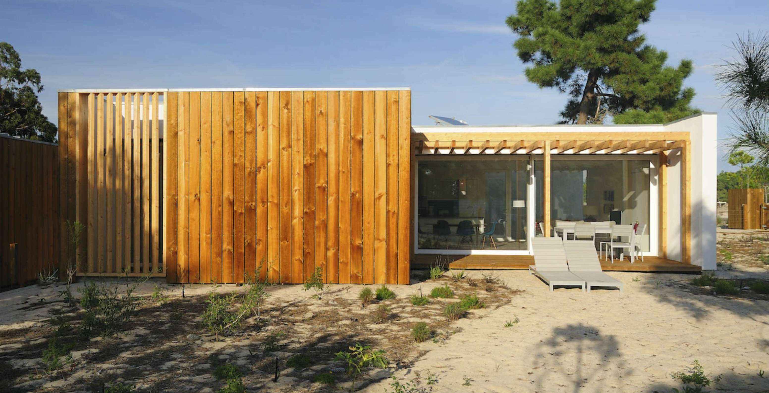 The 3-Bedroom Villas of Pestana Tróia Eco Resort have an outdoor area with two sun loungers