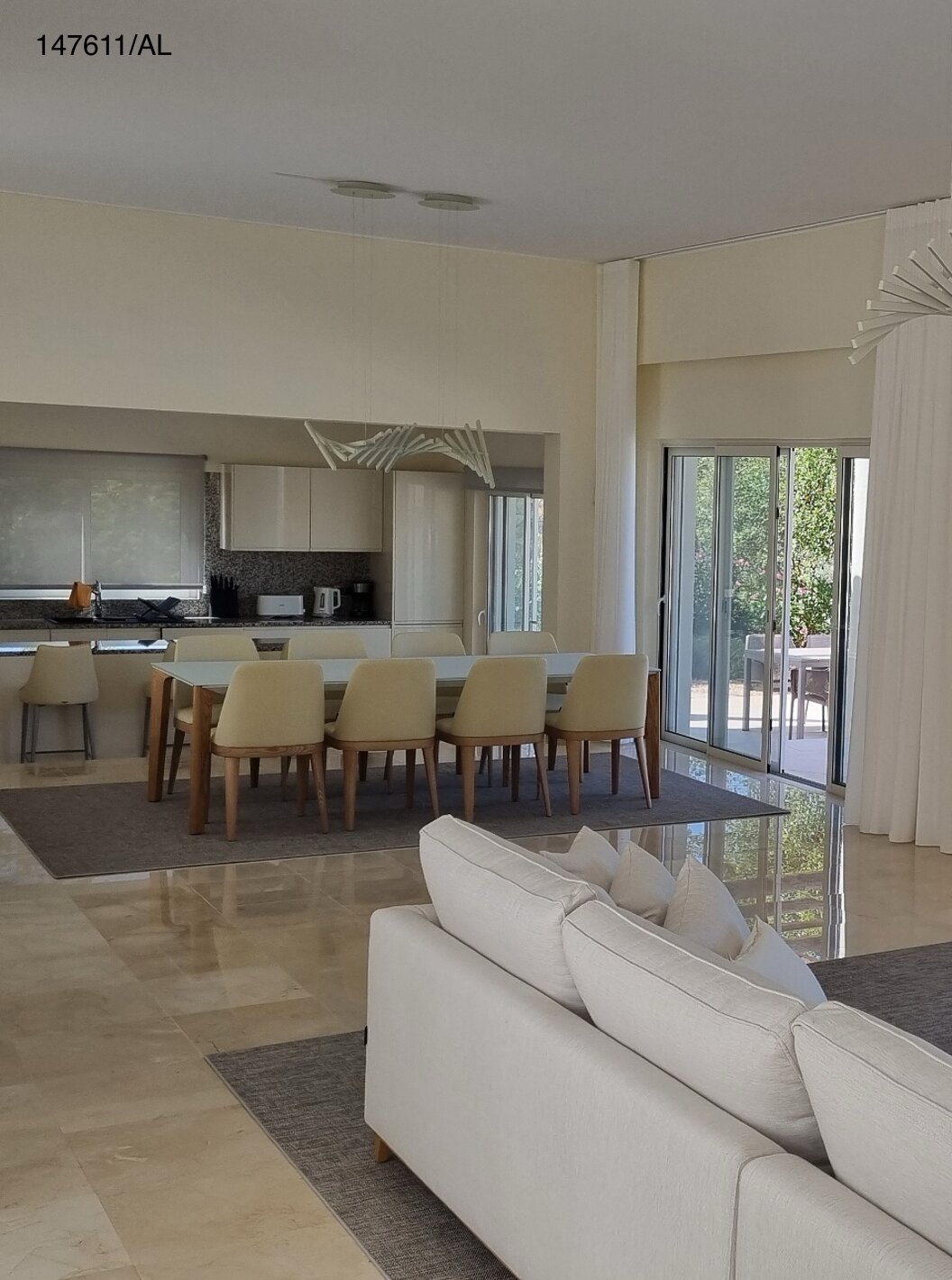 The Pestana Carvoeiro Golf V5 Superior Villa has a living room with a sofa, TV, and exterior view
