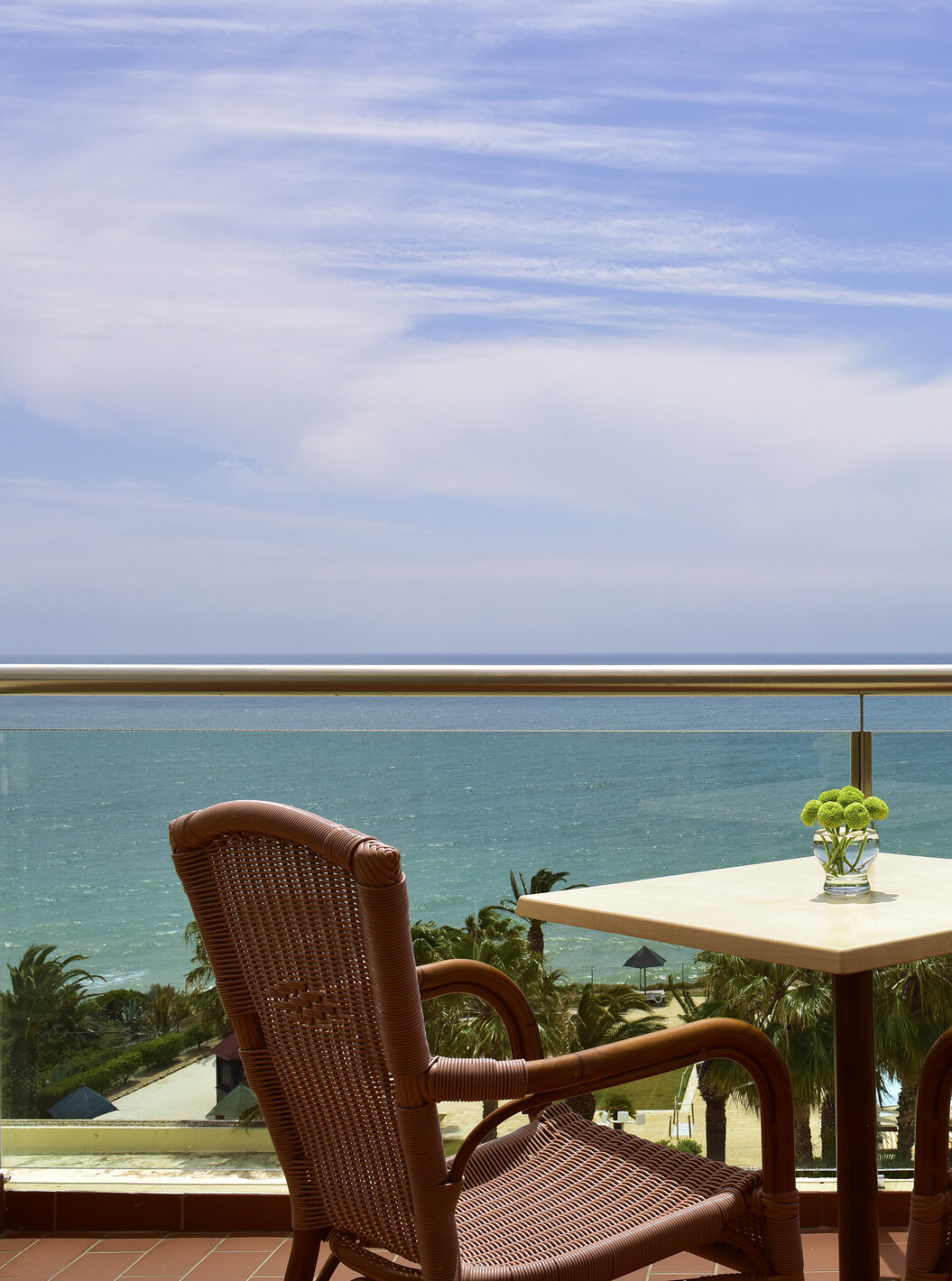 The T2 Suite at Pestana Viking has a balcony with table and two chairs, with sea view