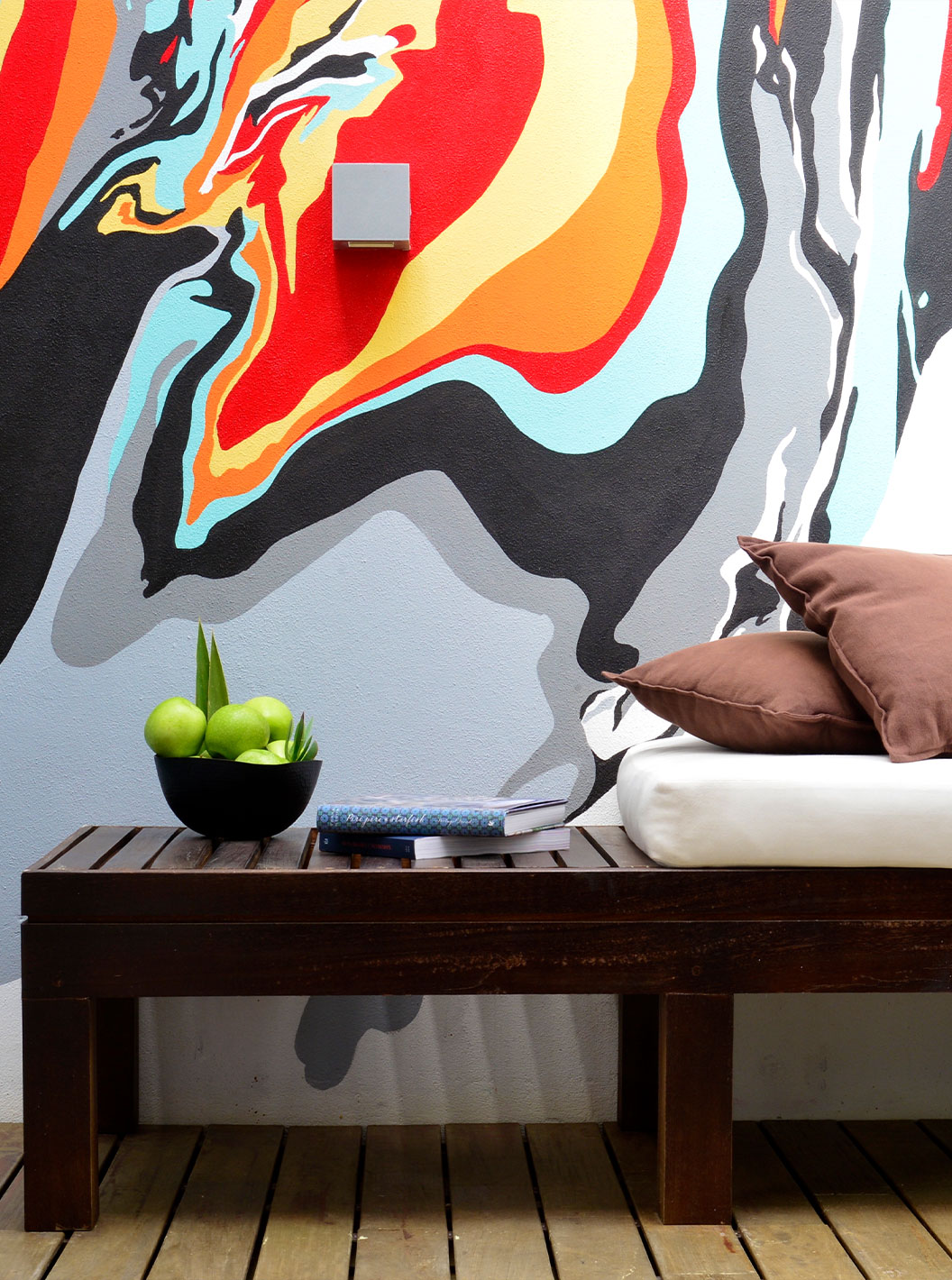 The Superior Room with Balcony at Pestana Cidadela Cascais has a wooden bench on the balcony and art on the wall