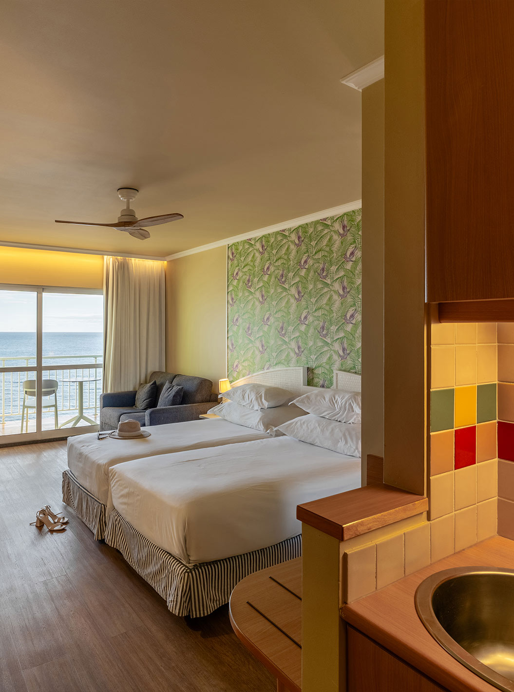 The Pestana Ocean Bay All Inclusive Premium Sea View has a double bed, a balcony with sea view, and a sofa