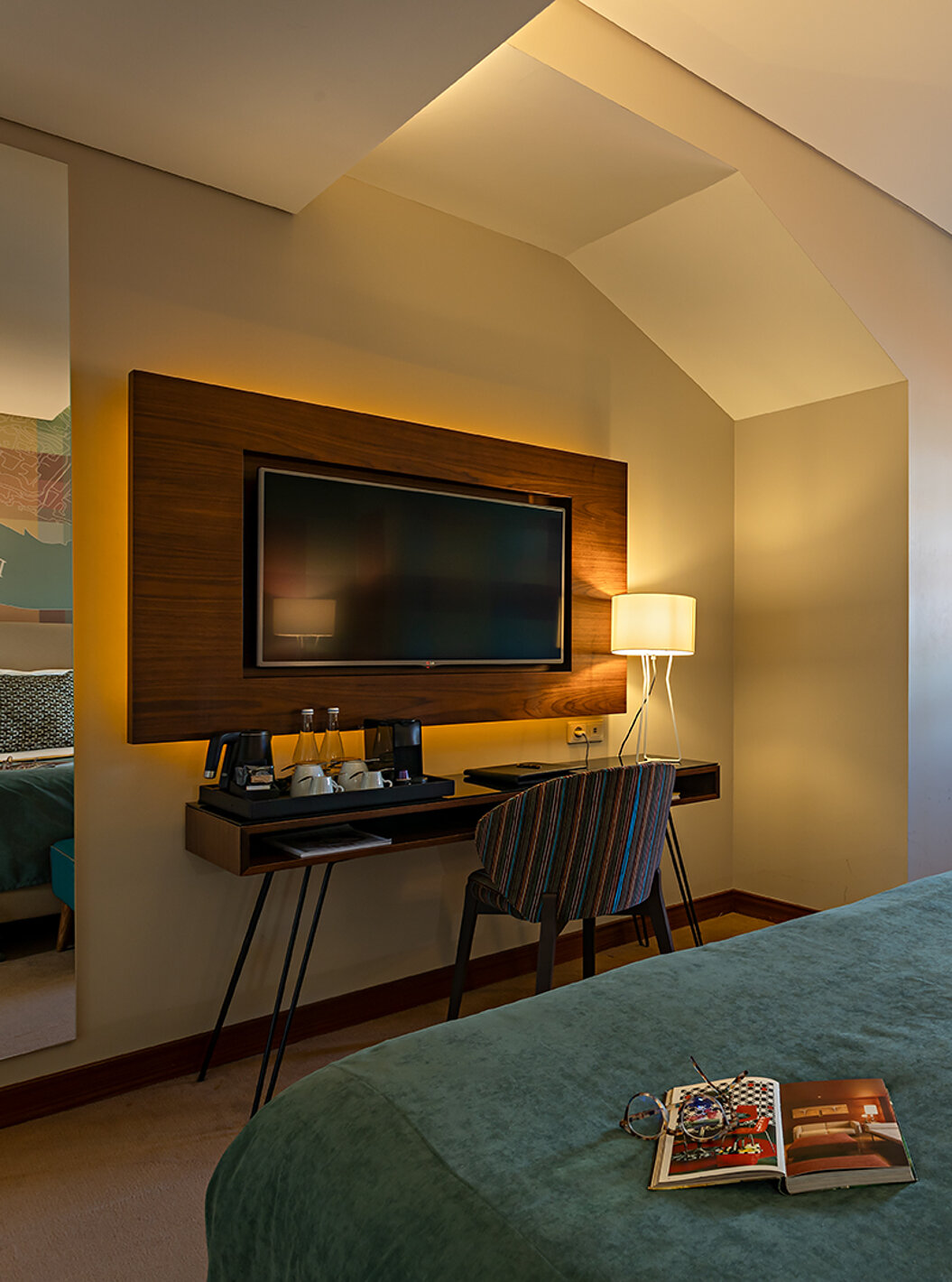The Classic at Pestana Vintage Porto has a television in front of the bed, a window with a view and a mirror