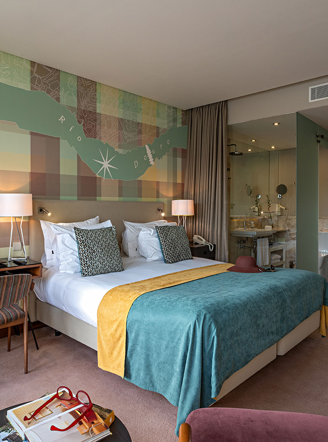 The Vintage River View Balcony at Pestana Vintage Porto has a double bed, a desk and a view of the interior of the bathroom