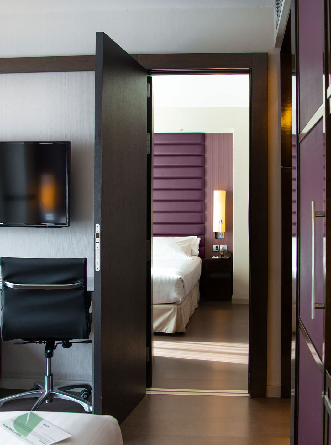 Large Family Room at Pestana Arena Barcelona has two connecting rooms, and a TV in each of the rooms