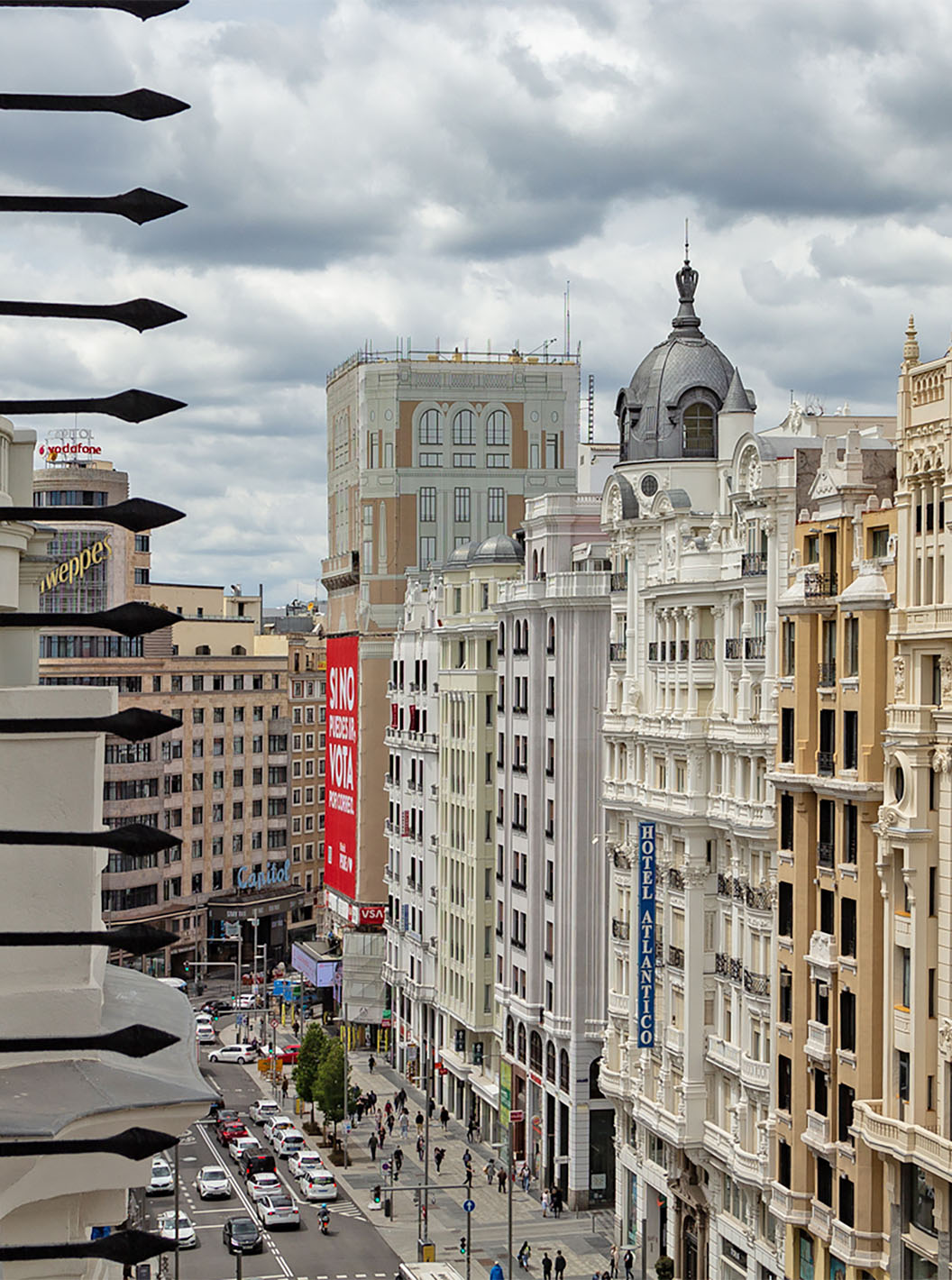 The Deluxe Grand Room with View at Pestana CR7 Gran Vía Madrid has a balcony with views of Gran Vía and nearby buildings