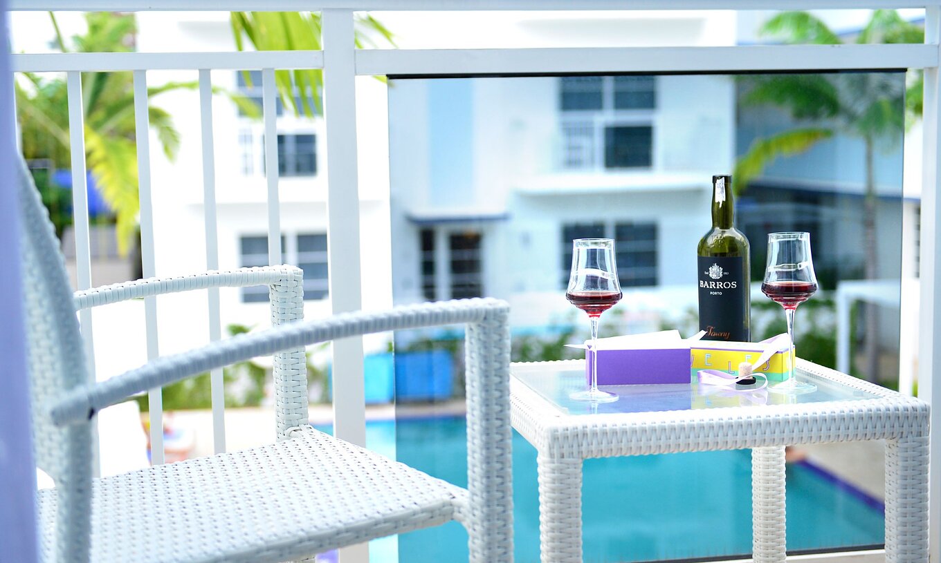 The Superior Double Beds with Balcony has pool and palm view at Pestana Miami