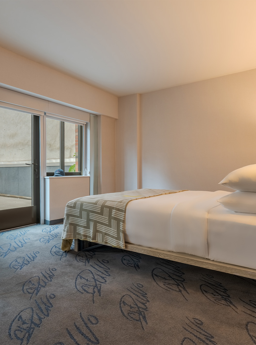 The ADA Junior Suite with Balcony and View at Pestana CR7 Times Square has a double bed, a TV, and a balcony