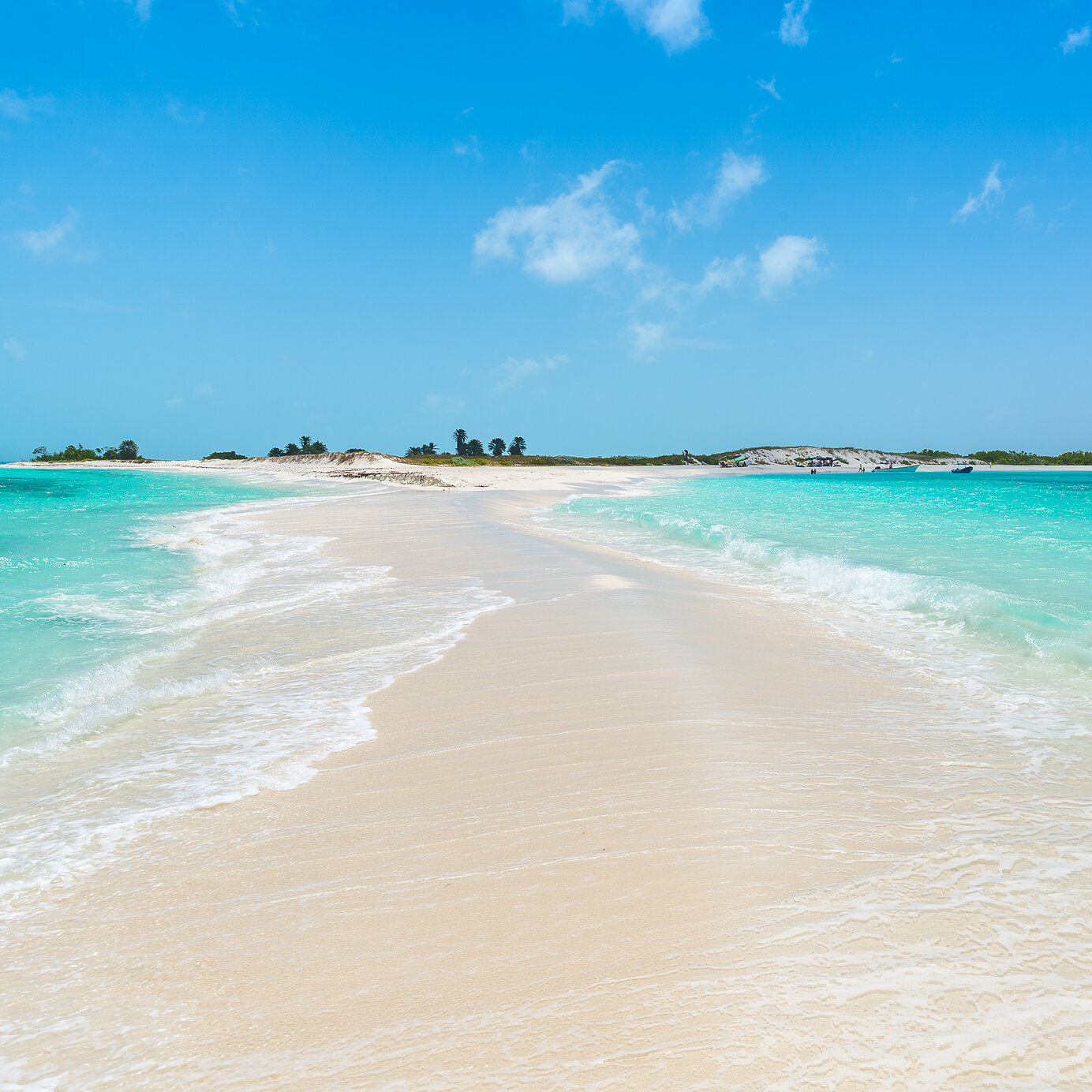 Stay at a Pestana hotel and relax on the white sandy beaches and crystal-clear waters of Los Roques, Venezuela.