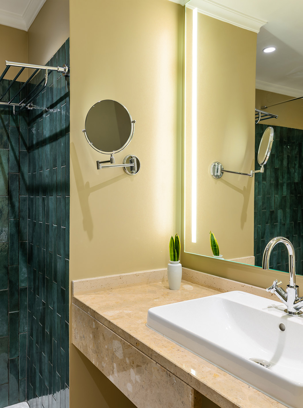 The Partial Sea View Room with Balcony at Pestana Quinta Perestrello has a bathroom with a washbasin and tiles.