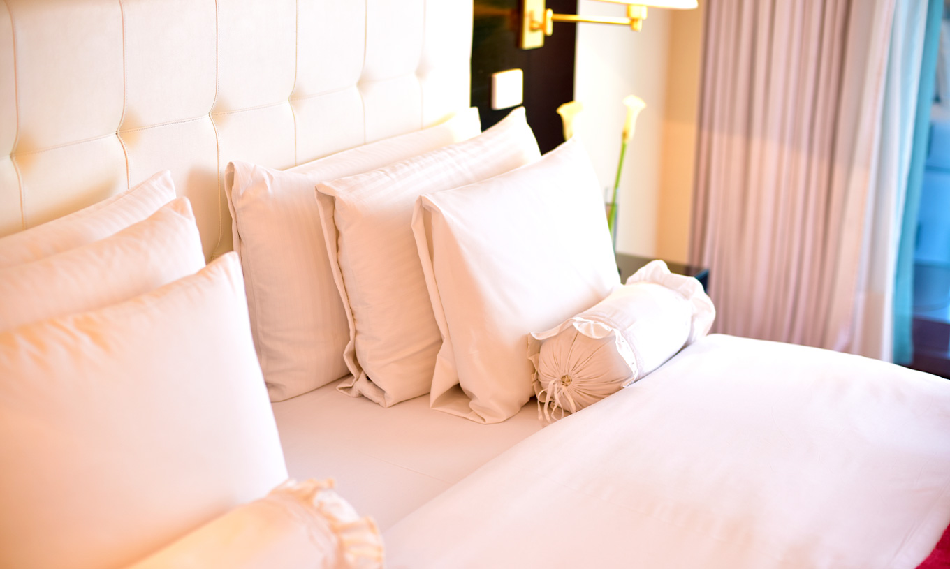 De Queen Standard van Pestana Buenos Aires heeft tweepersoonsbed met verschillende soorten kussens