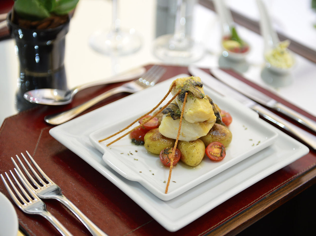 Het restaurant Cais da Ribeira, van het hotel in Curitiba, Brazilië, serveert internationale en Braziliaanse gerechten