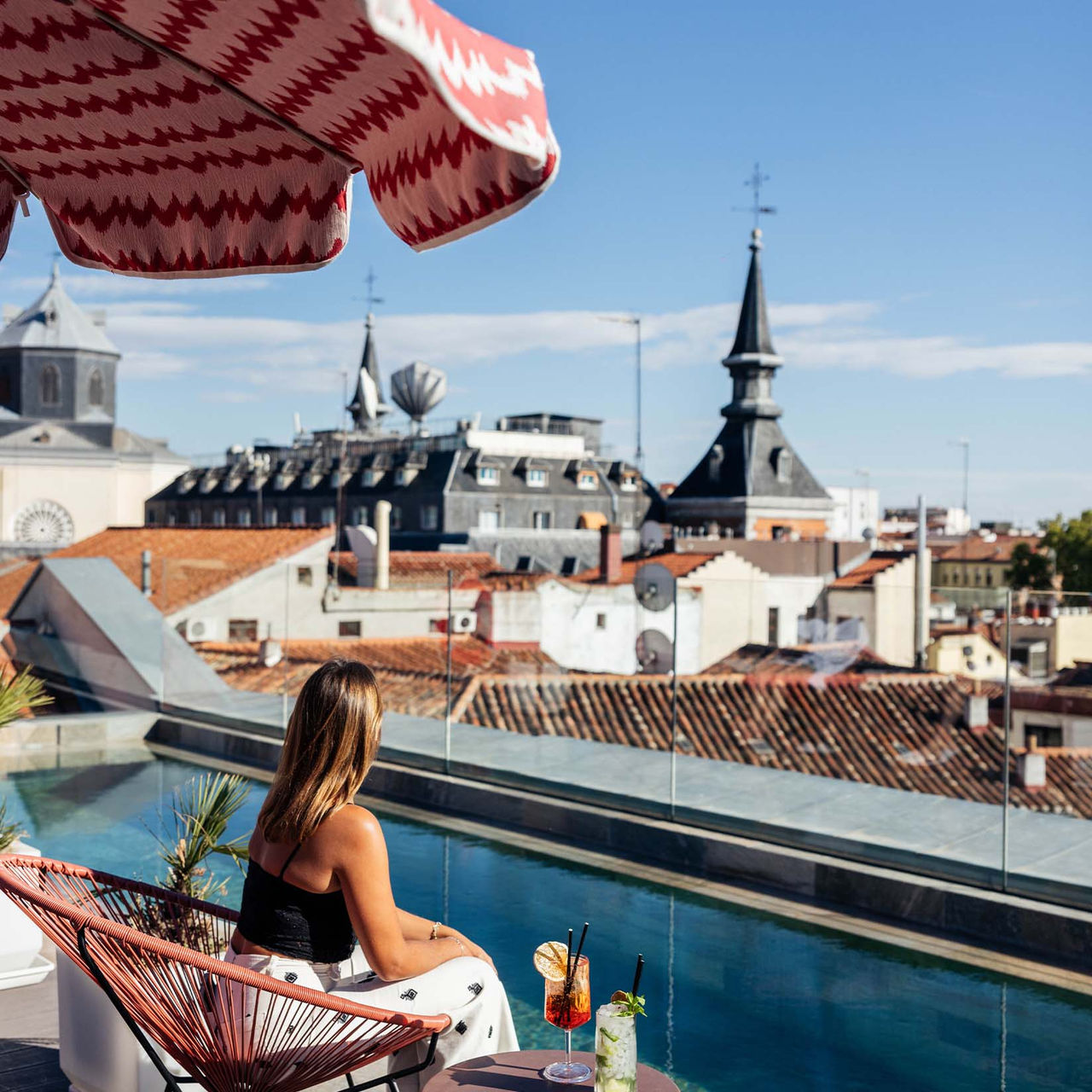 Outdoor pool on the rooftop of Plaza Mayor Madrid, a hotel in the historic center of Madrid, with panoramic city views